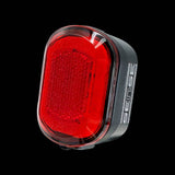 Moon Sport VELA 200lm front bike light and ORION 50lm rear bike light set in black, designed for cycling safety and visibility.