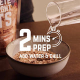 Veloforte plant-based overnight oats with seeds and real fruit, high-protein breakfast in a clear jar on a wooden table.