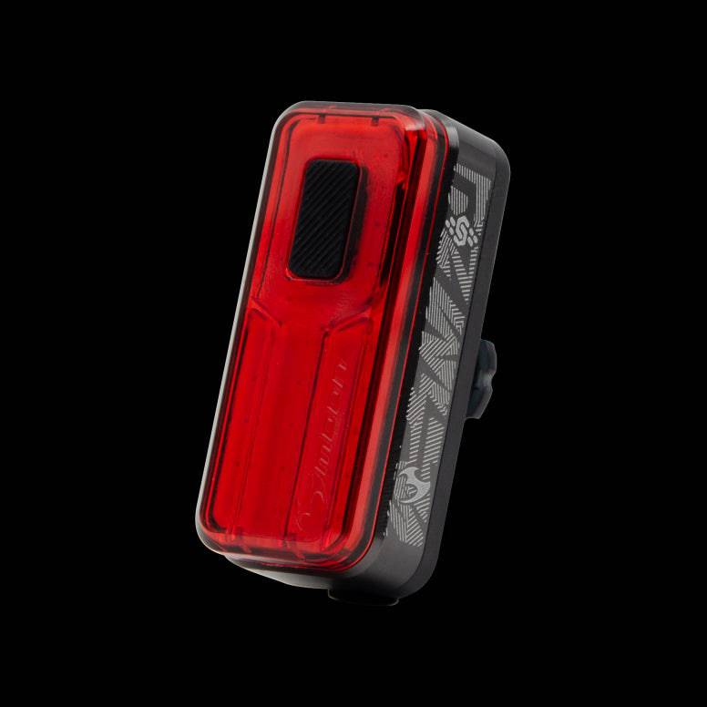 Moon Sport Helix Sense 150lm rear bike light with auto brightness and braking features, mounted on a bicycle.