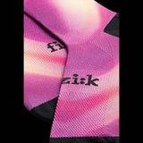 Fizik Fade cycling socks showing breathable, moisture-wicking fabric with fade design, ideal for cycling performance and comfort.