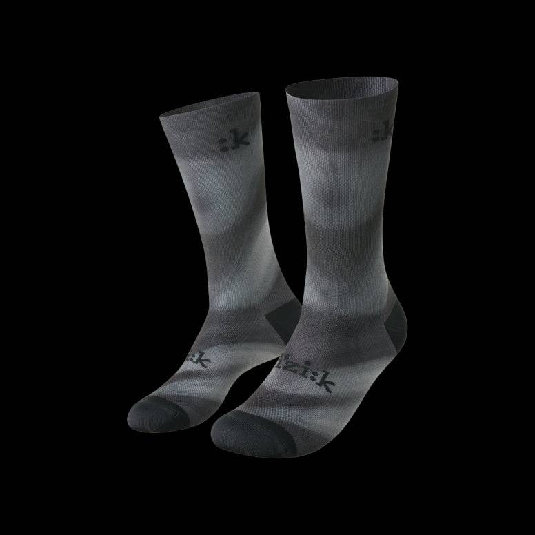 Fizik Fade cycling socks in black and white with breathable, moisture-wicking fabric and durable construction for performance riding.