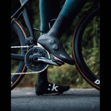 Fizik waterproof cycling overshoes for road and off-road shoes, designed to protect and keep feet dry during rides.
