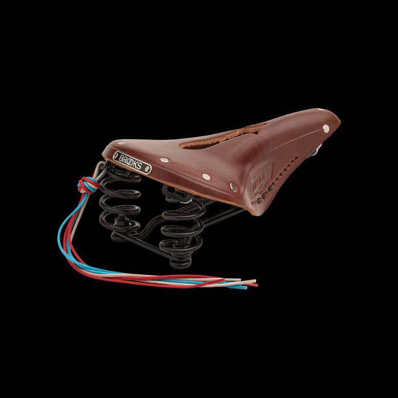 Brooks Flyer Carved Touring Saddle with pressure relief cut-out and steel rails, designed for comfortable bike riding.