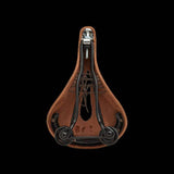 Brooks Flyer carved touring saddle with pressure relief cut-out and steel rails, designed for comfortable cycling.