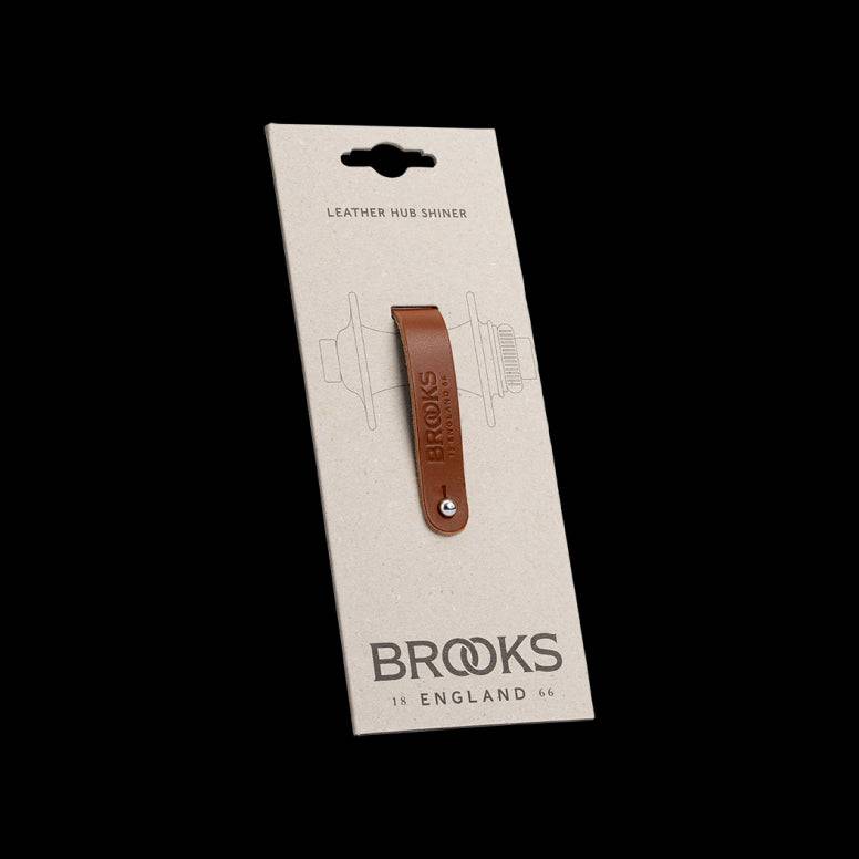 Brooks Hub Shiner leather bike hub cleaner and keychain accessory, featuring a compact leather keychain with Brooks branding.