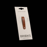 Brooks Hub Shiner leather bike hub cleaner and keychain accessory, featuring a compact leather keychain with Brooks branding.