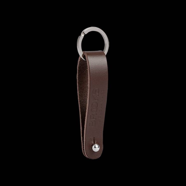 Brooks Hub Shiner leather bike hub cleaner and keychain accessory, featuring polished leather and metal components.
