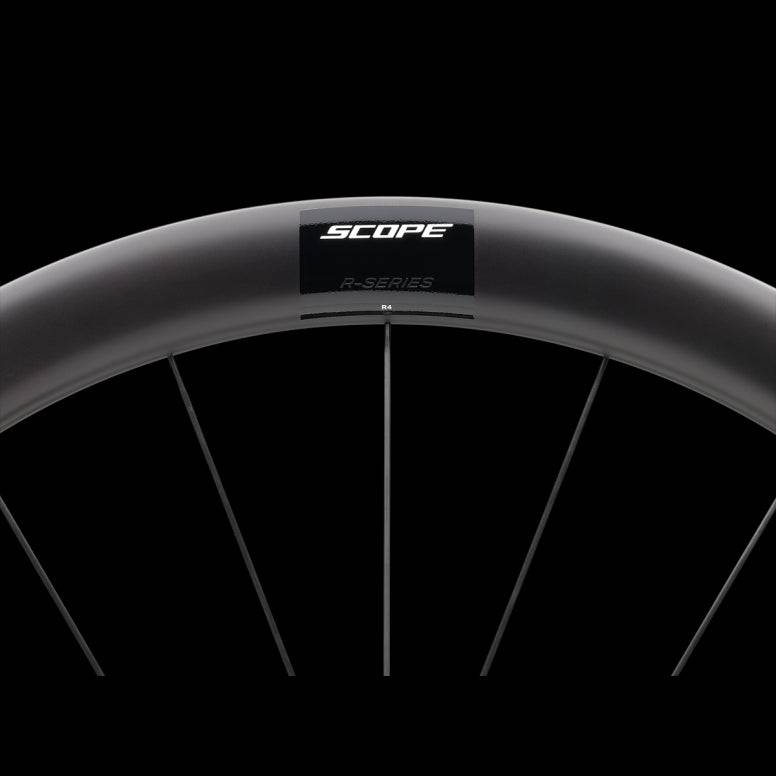 Scope Cycling R4 V2 45mm road wheelset with aerodynamic tubeless-ready wheels, showing the sleek carbon rims and aerodynamic design.