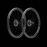 Scope Cycling R4.A V2 45mm allroad wheelset with tubeless-ready, aerodynamic design, shown with black rims and spokes.