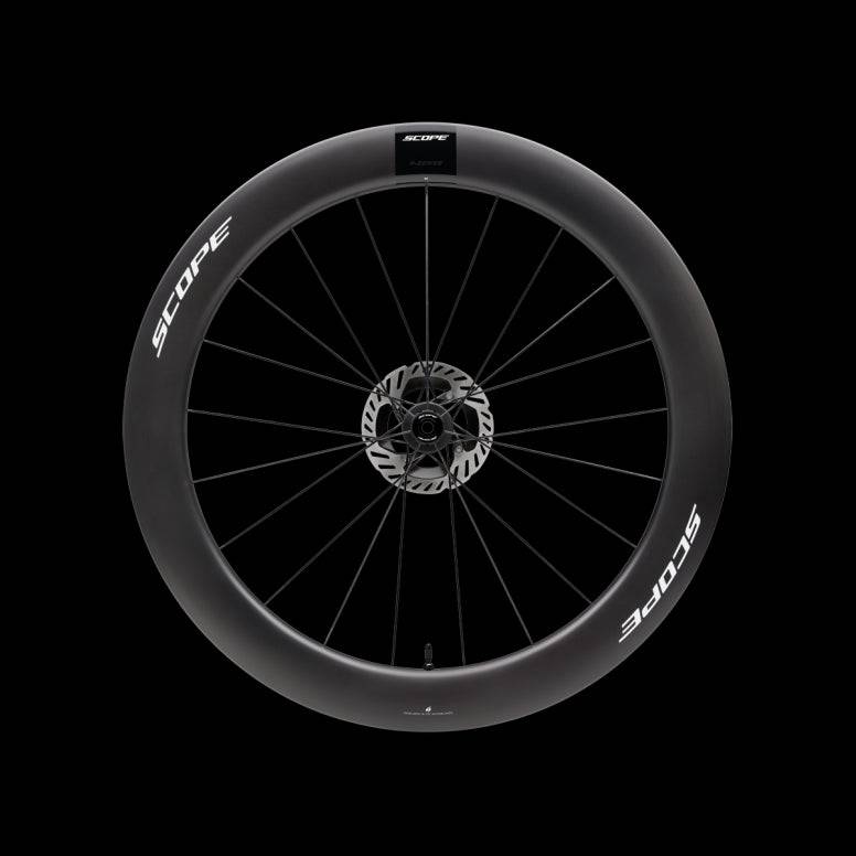 Scope Cycling R6 V2 65mm tubeless clincher road wheelset with aerodynamic racing wheels, shown from the side.