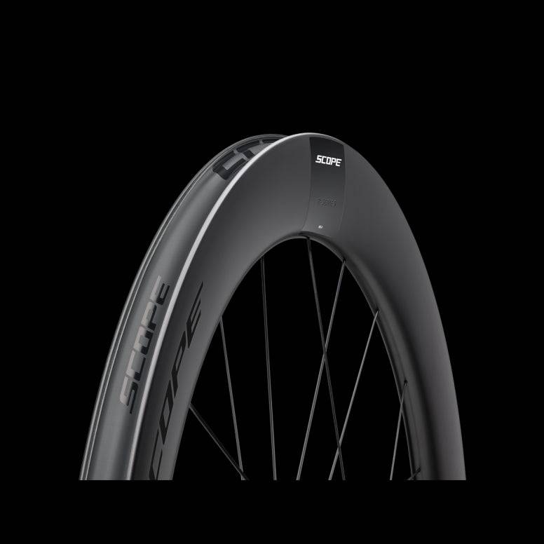 Scope Cycling R6.A V2 65mm allroad wheelset with tubeless-ready design and aerodynamic components, shown with spokes and rims.