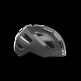 MET E-Mob Mips helmet for urban e-bike riders with built-in USB LED rear light, lightweight cycling helmet with safety features.
