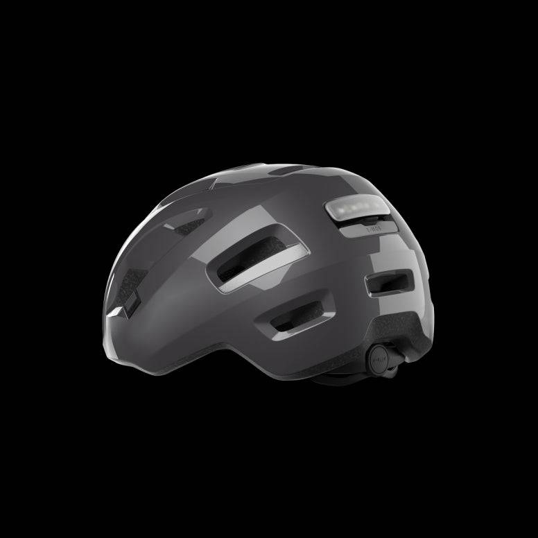 MET E-Mob Urban E-Bike Helmet with USB LED light, safety certification, and adjustable straps for comfortable cycling safety.