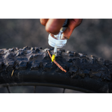 Crankbrothers Plug Mate tubeless tyre repair kit with reusable anchors and plugs for workshop use, compact and easy to handle.