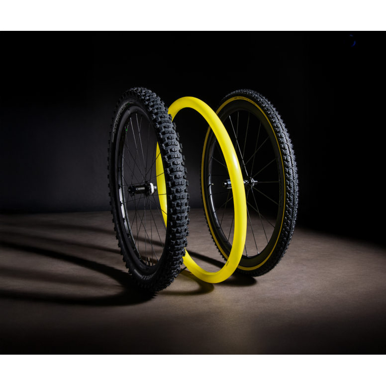 Pirelli Scorpion SmarTUBE Lite TPU inner tube for gravel and MTB wheels, shown installed on a bike wheel.