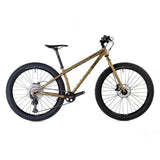 Surly Karate Monkey 27.5+ mountain bike frame with Deore drivetrain, shown with rugged tires and sturdy bike construction.