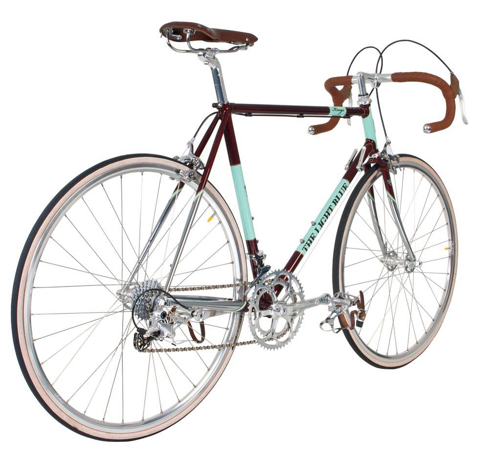 Light Blue Kings retro road bike with Reynolds 853 steel frame, 2x9 speed, vintage style, featuring a light blue finish and classic design.