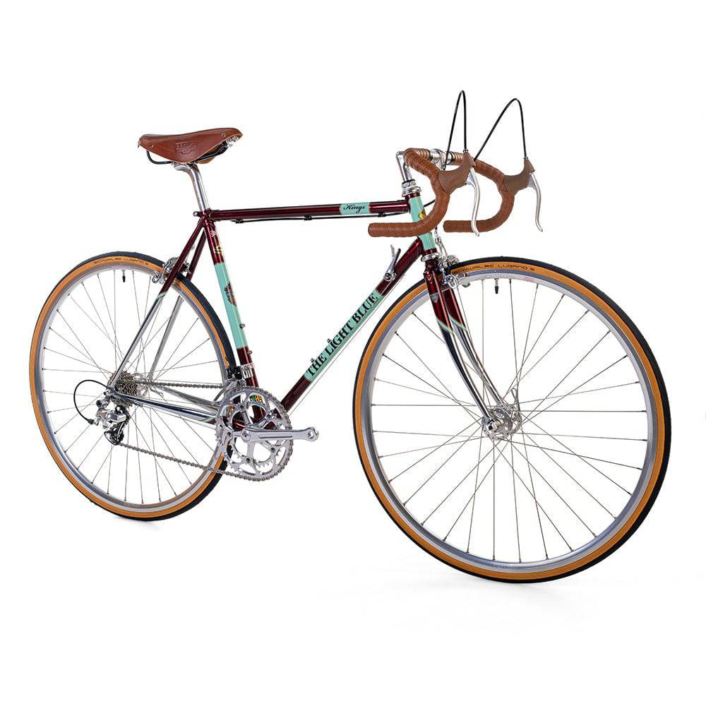 Light Blue Kings retro road bike with Reynolds 853 steel frame, 2x9-speed gear system, vintage style, shown in the image.