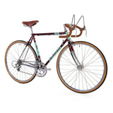 Light Blue Kings retro road bike with Reynolds 853 steel frame, 2x9-speed gear system, vintage style, shown in the image.