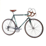 Light Blue St Johns retro road bike with Shimano Sora gears and Reynolds 725 frame, shown in light blue color.