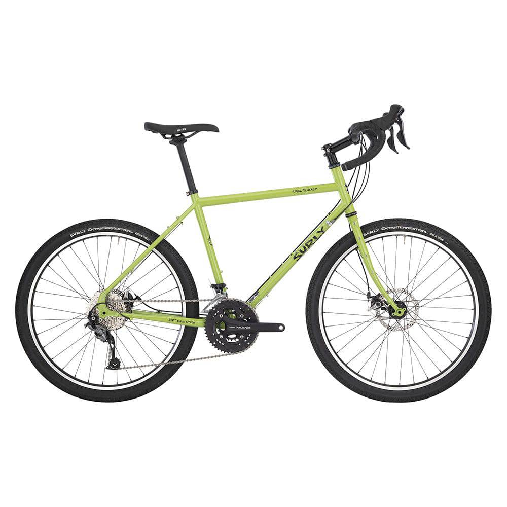 Surly Disc Trucker 26-inch touring bike with disc brakes, rugged frame, and mounting points for touring gear.