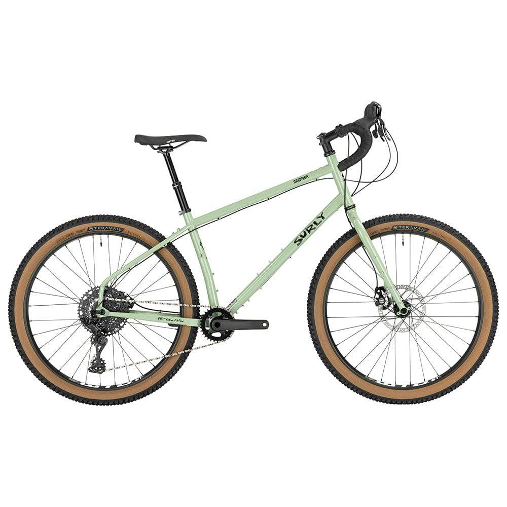 Green Surly Grappler drop-bar mountain bike frame designed for trail riding and mixed terrain, featuring durable construction.
