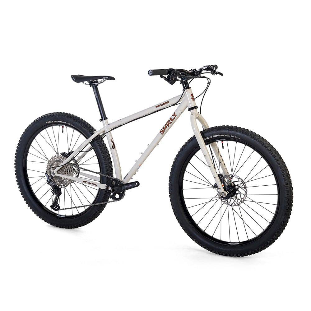 Surly Karate Monkey 27.5+ mountain bike frame with Deore drivetrain, white color, lightweight aluminum construction, ready for off-road riding.