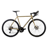 Surly Midnight Special 105 700c road plus bike with gold frame, designed for pavement and gravel riding.