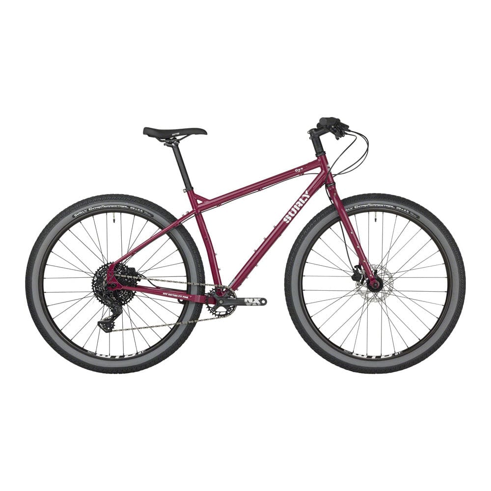 Surly Ogre chromoly steel mountain bike frame featuring versatile design for commuting and trail riding, shown in purplish color.