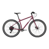 Surly Ogre chromoly steel mountain bike frame featuring versatile design for commuting and trail riding, shown in purplish color.