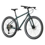 Surly Ogre chromoly steel mountain bike frame in dark gray, designed for commuting and trail riding with durable construction.