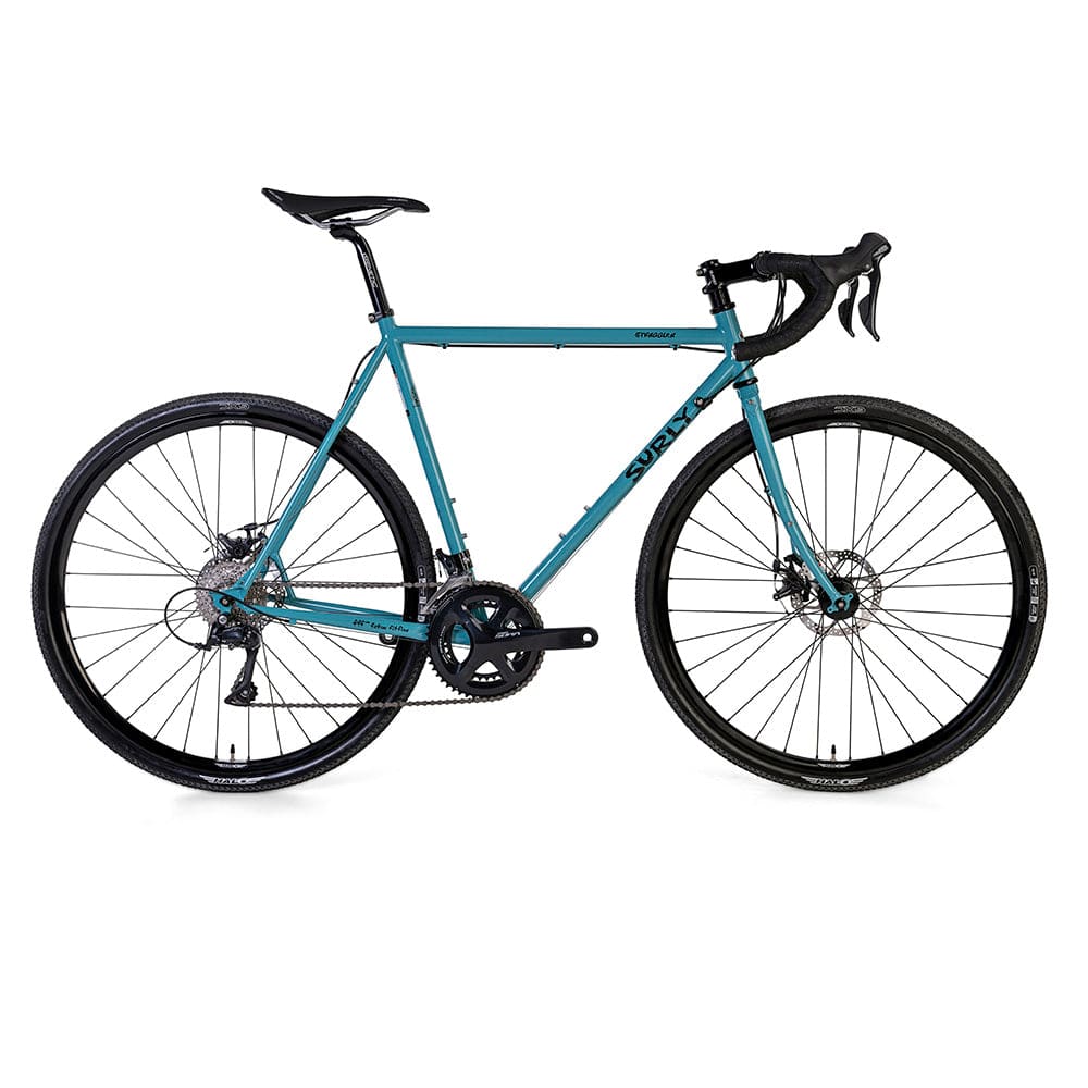Surly Straggler 700c Sora gravel and commuter bike with a steel frame, shown with drop handlebars and rugged tires.