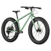 Surly Wednesday fat bike frame in Shangri La Green with 26x4.6-inch tire clearance, showcasing the versatile bike design.