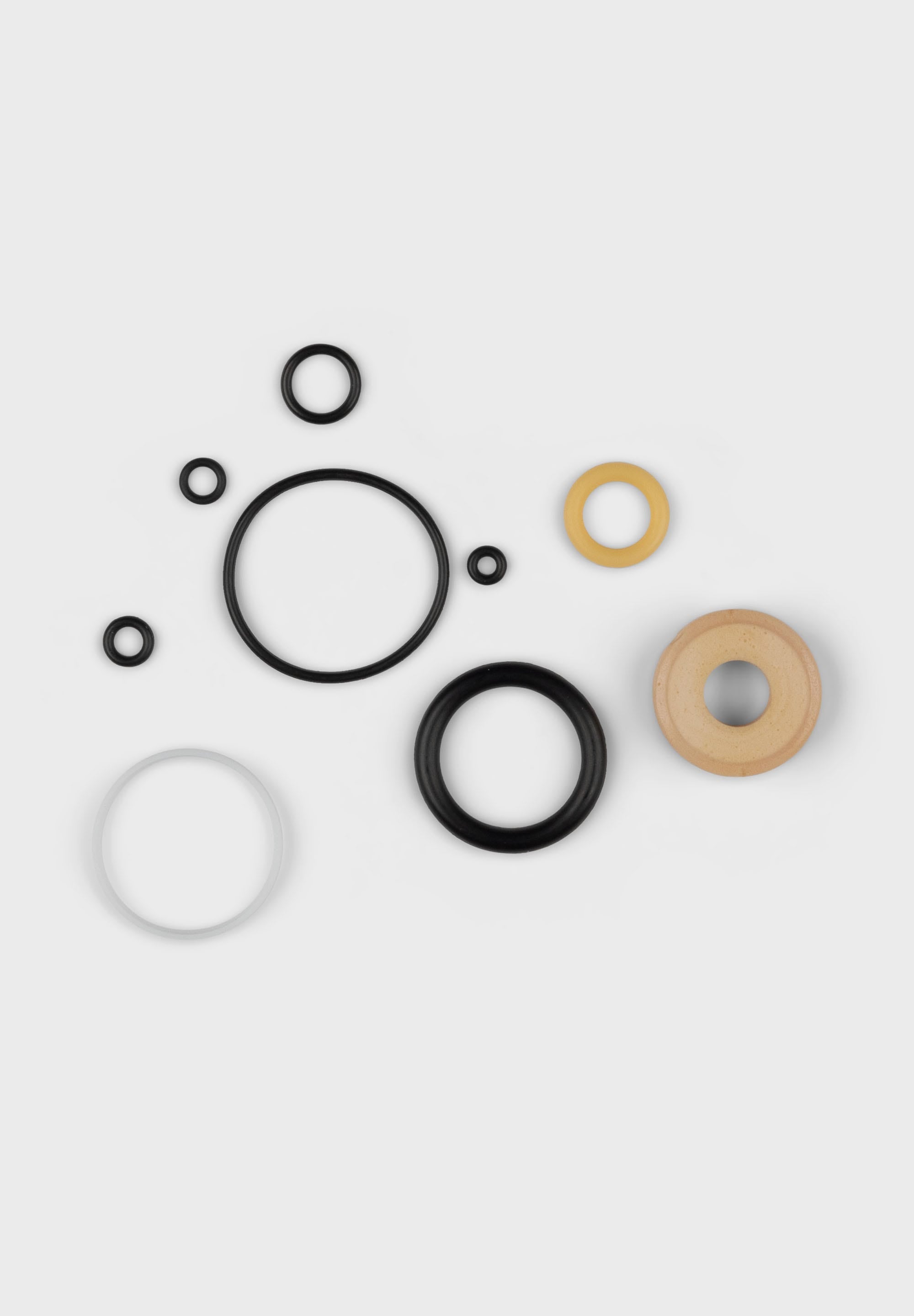 Fox Float Damper Rebuild Seal Kit 2024 for rear shock maintenance, featuring seals and components for Fox suspension repairs.