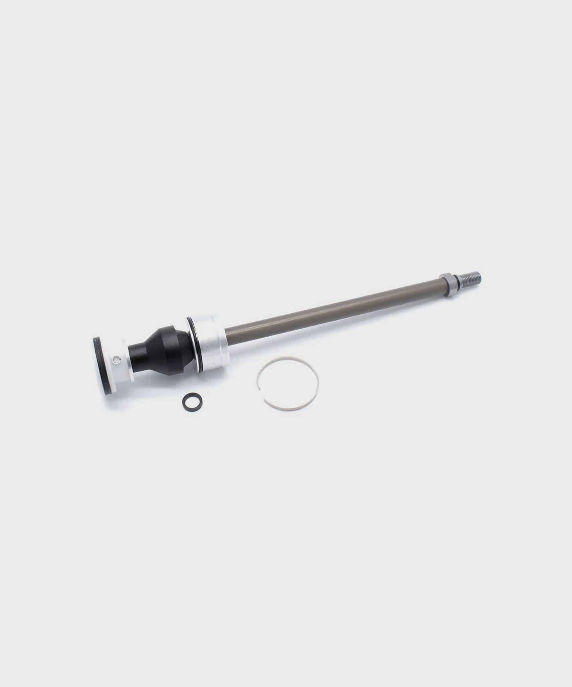 Fox 34mm NA2 Float Air Shaft Assembly replacement component with spares, shown in close-up view.