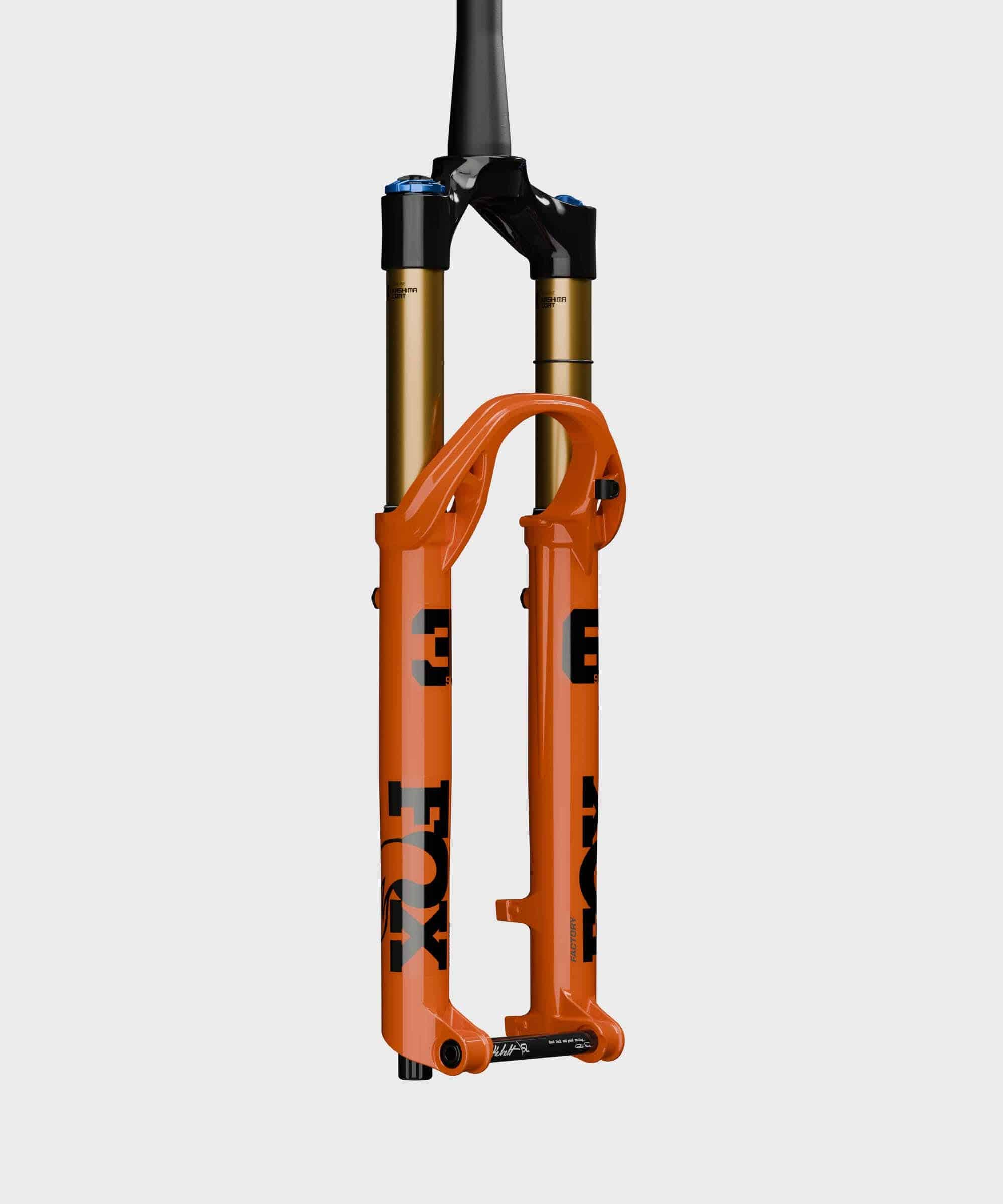 Fox 36 SL Float Factory GRIP X tapered mountain bike suspension fork with black stanchions and orange decals.