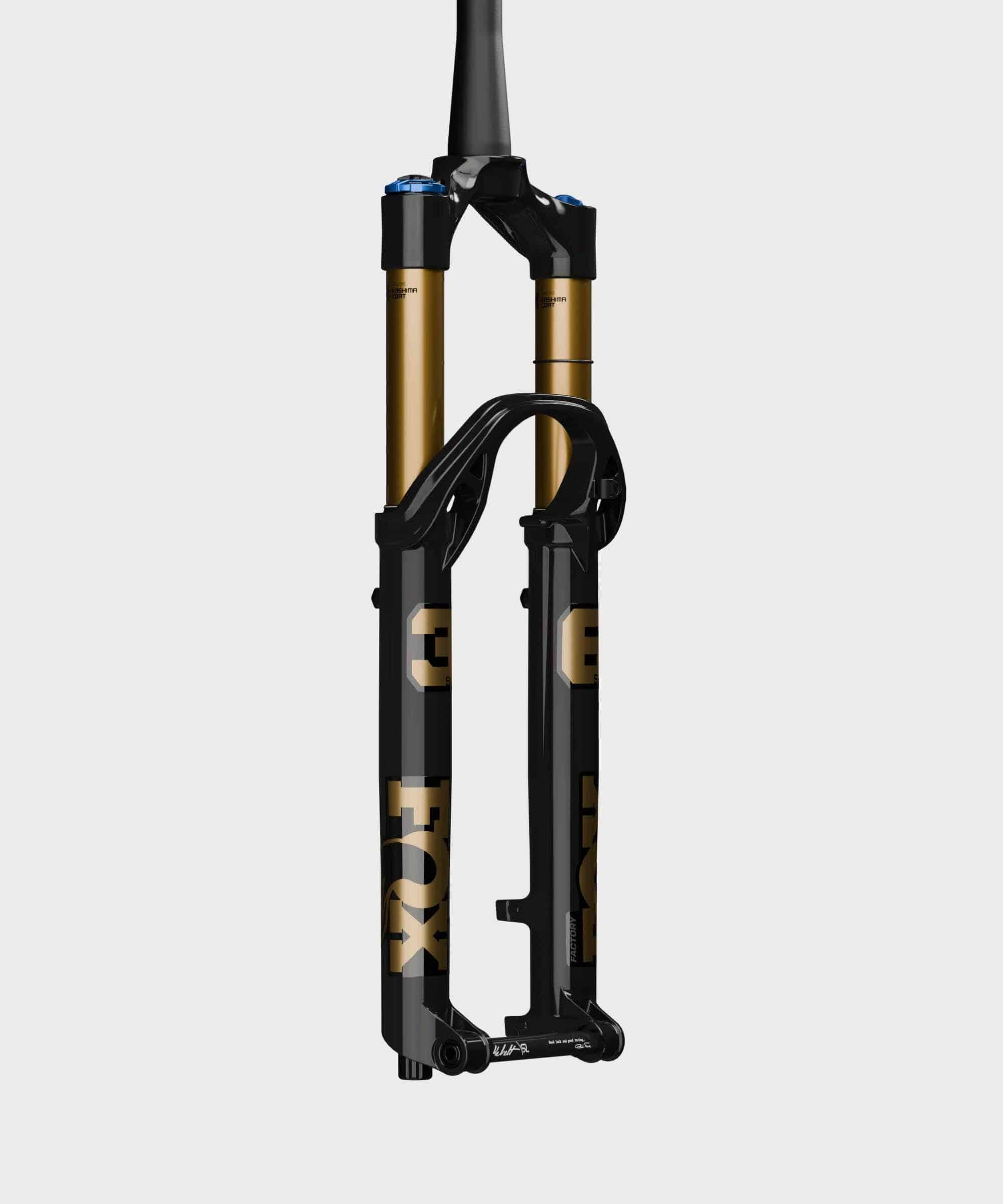 Fox 36 SL Float Factory GRIP X tapered mountain bike suspension fork, showing the sleek black and gold design with stanchions and crown.