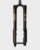 Fox Podium Factory GRIP X2 tapered fork for 29-inch mountain bikes, 160-170mm travel, showcasing the suspension components.