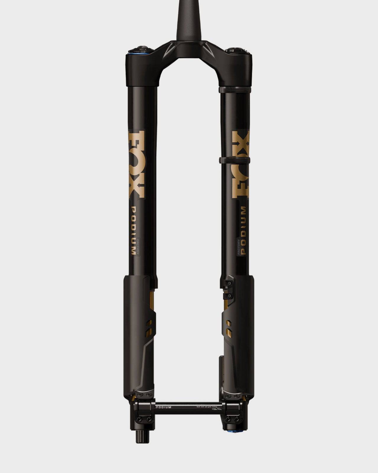 Fox Podium Factory GRIP X2 tapered fork for 29-inch mountain bikes with 160-170mm travel, showing the fork's sleek design and stanchions.