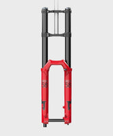 Marzocchi Bomber 58 GRIP downhill fork with advanced suspension technology, showing the sturdy fork with gold stanchions and suspension components.