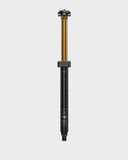 Fox Transfer Neo Factory wireless dropper seatpost for mountain bikes, showcasing sleek design and remote lever for precise height adjustments.