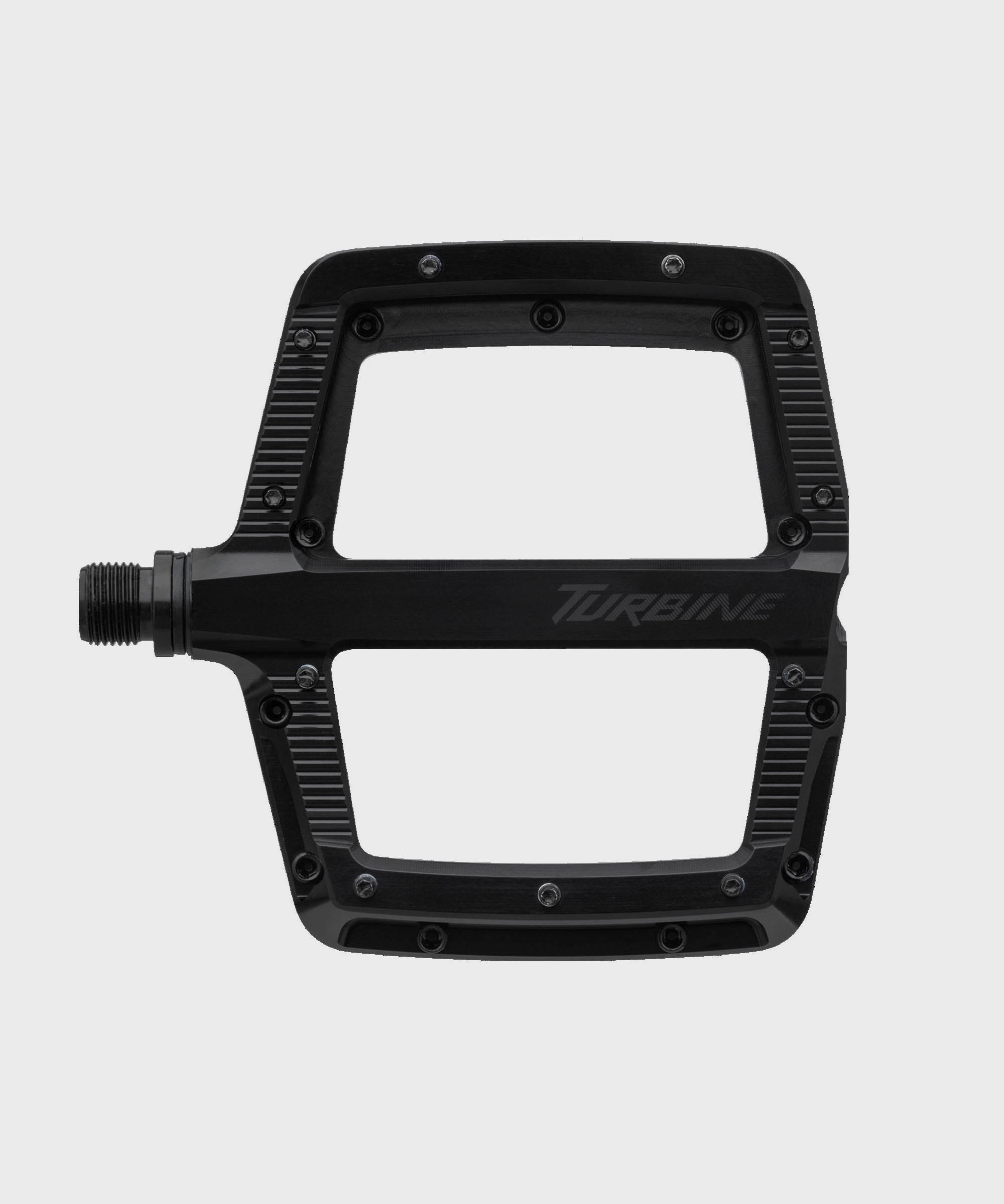 Race Face Turbine mountain bike pedals with adjustable pins for maximum grip, shown with black body and metal pins.