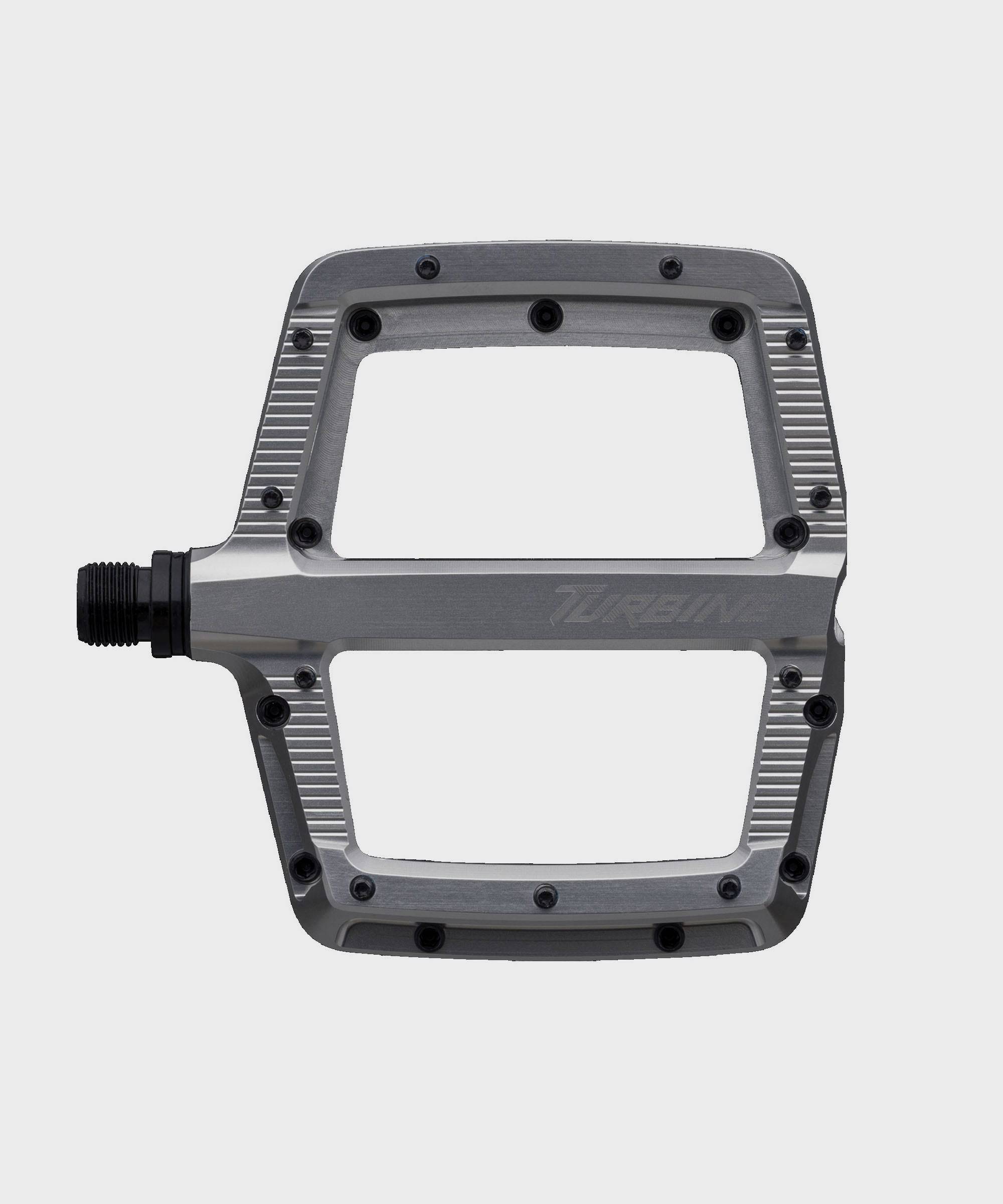 Race Face Turbine mountain bike pedals with adjustable pins for improved grip and durability, shown with metal pins and pedal body.