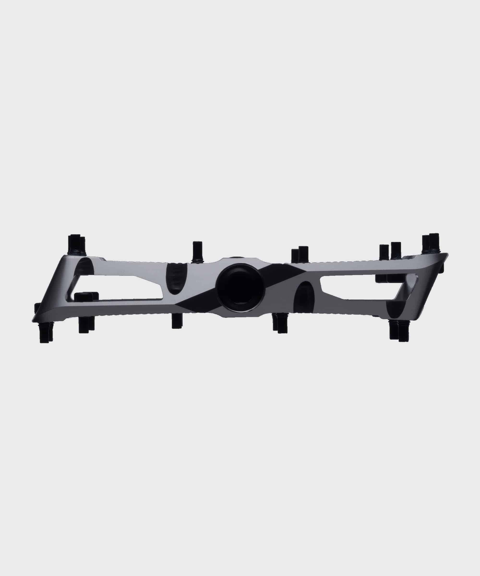 Race Face Turbine mountain bike pedals with adjustable pins for enhanced grip, shown with metal body and grip pins.