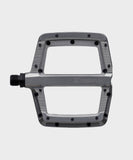 Race Face Turbine mountain bike pedals with adjustable pins for improved grip and durability, shown with metal pins and pedal body.