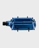 Race Face Turbine mountain bike pedals with adjustable pins for enhanced grip, showcasing rugged metal pedals and grip pins.
