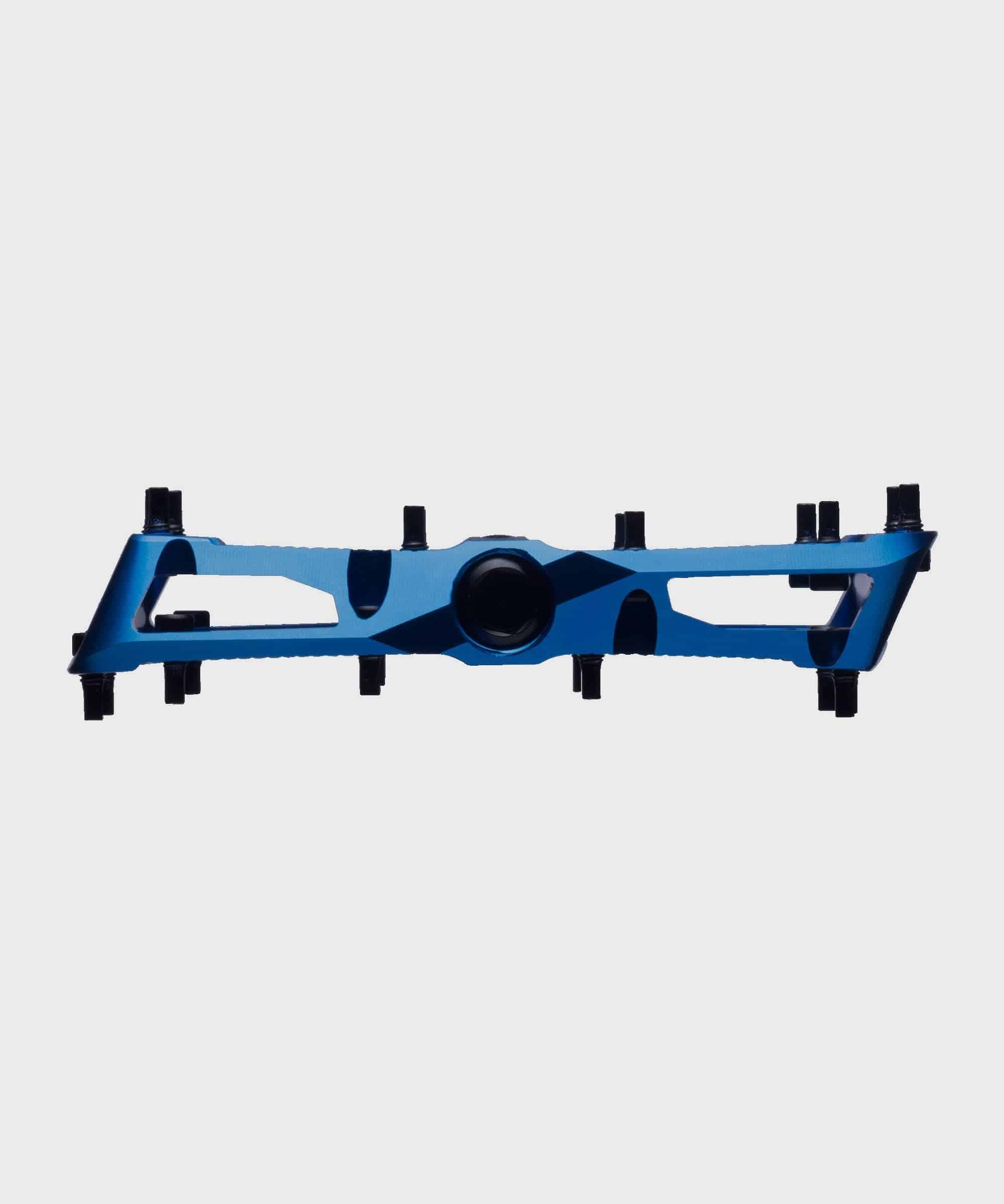 Race Face Turbine mountain bike pedals with adjustable pins, featuring a durable metal body and maximum grip for cycling components.