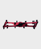 Race Face Turbine mountain bike pedals with adjustable pins and high grip design, showcasing durable metal construction.