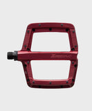 Race Face Turbine mountain bike pedals with adjustable pins for maximum grip, featuring a durable metal body and clipless design.