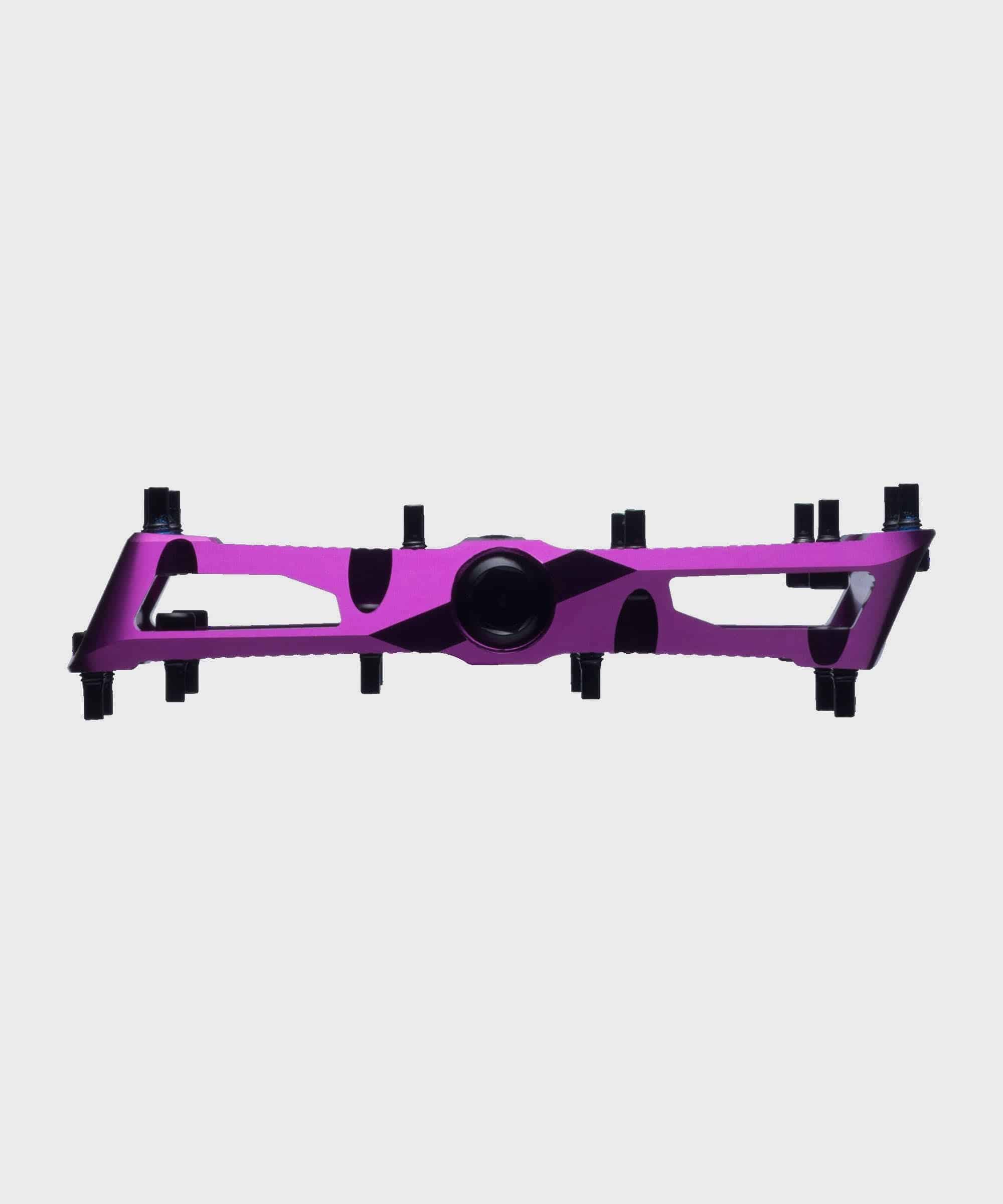 Race Face Turbine mountain bike pedals with adjustable pins for enhanced grip, showcasing durable metal construction.
